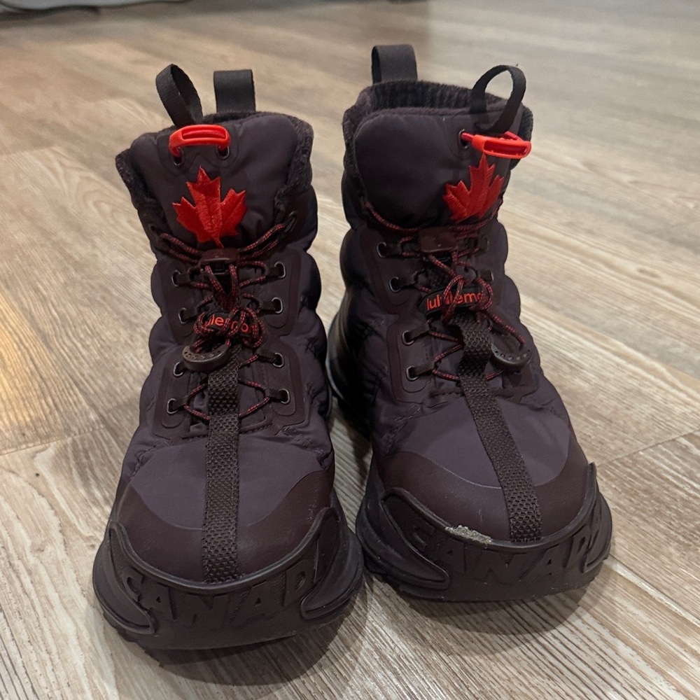 Lululemon team Canada Black and Red Winter Boots with Maple Leaf Design